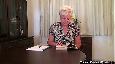 very sexed grandma Sandie massages her pierced love button